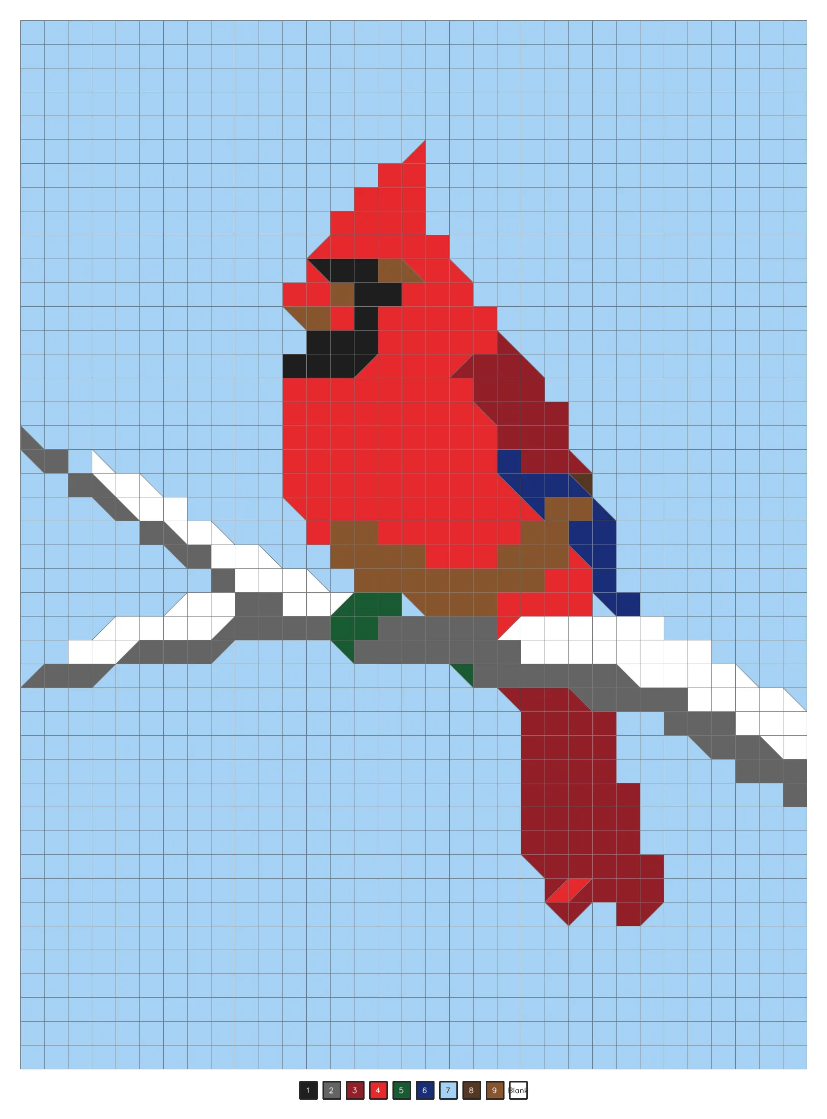 A completed mystery color by number puzzle showing a red cardinal on a snowy branch